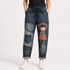 Damskie jeansy retro o luźnym kroju z aplikacją i elastycznym pasem – jeansy haremowe w niepowtarzalnym stylu (rozmiary S-5XL, 2 kolory)
